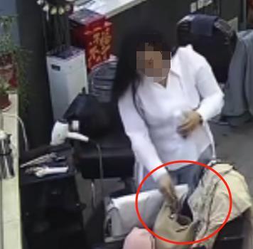 女子偷美发店千元剪刀被拘 监控记录全过程